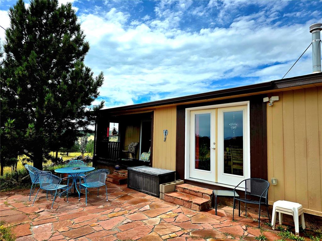 Back yard with new french doors for access