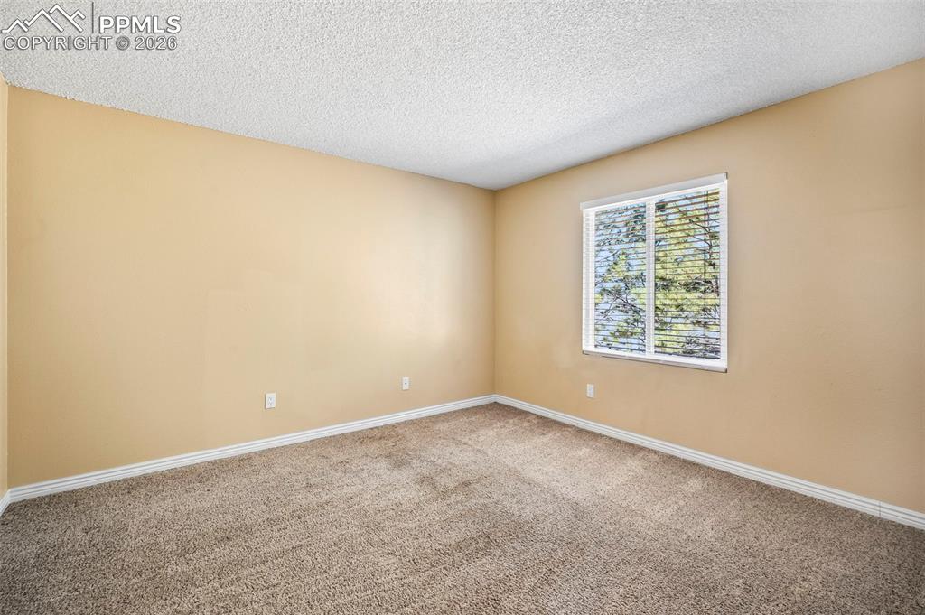 Additional bedrooms provide refined flexibility for guests, work, or creative pursuits