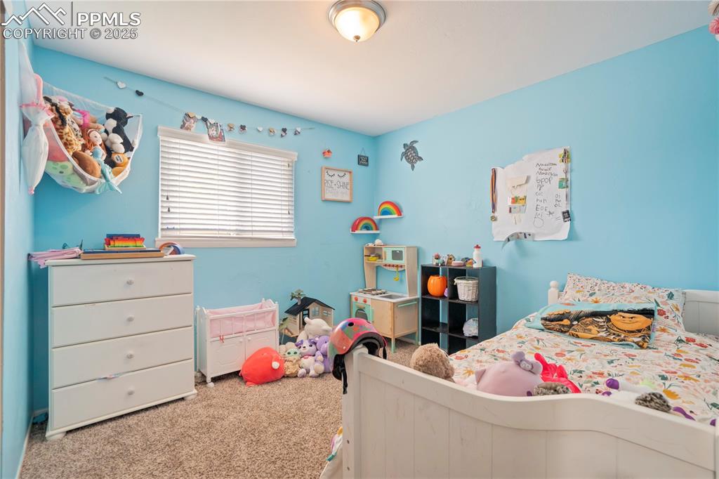 Bedroom with carpet flooring