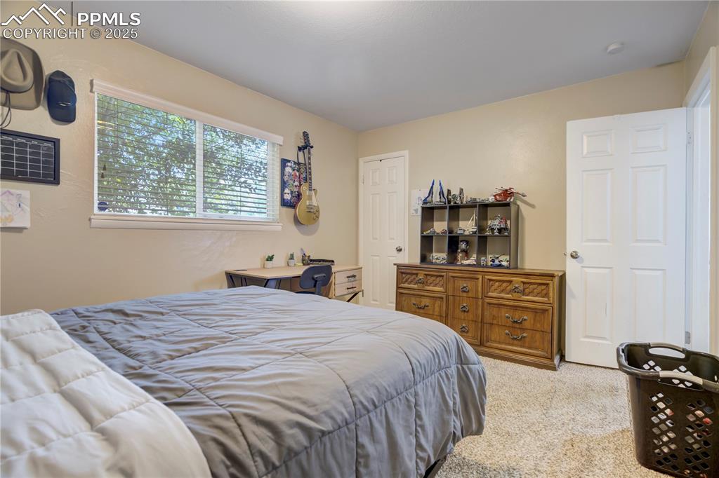 Bedroom featuring carpet floors