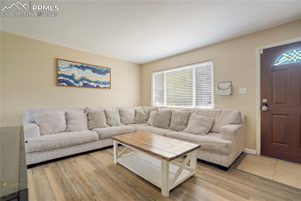 Living area featuring light wood-style flooring