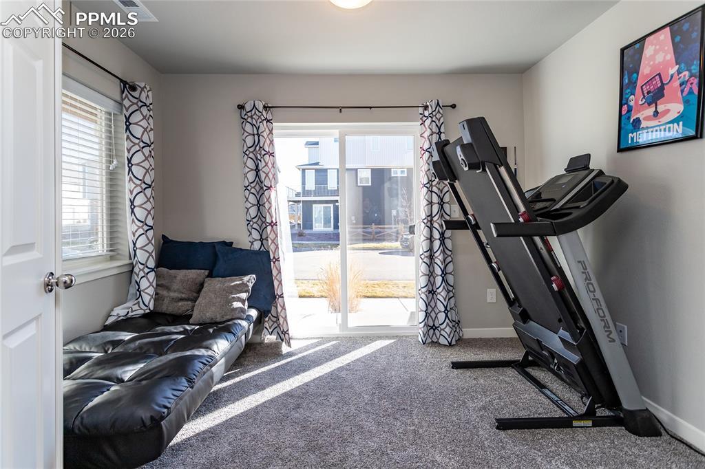 Main level bonus room with French doors