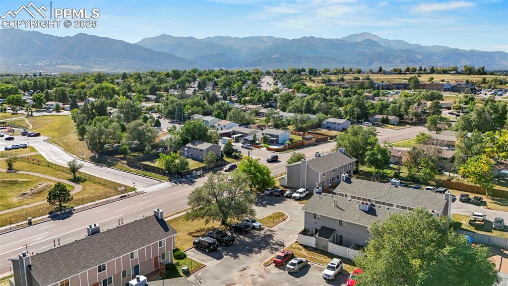 Aerial view of residential area with a mountain backdrop