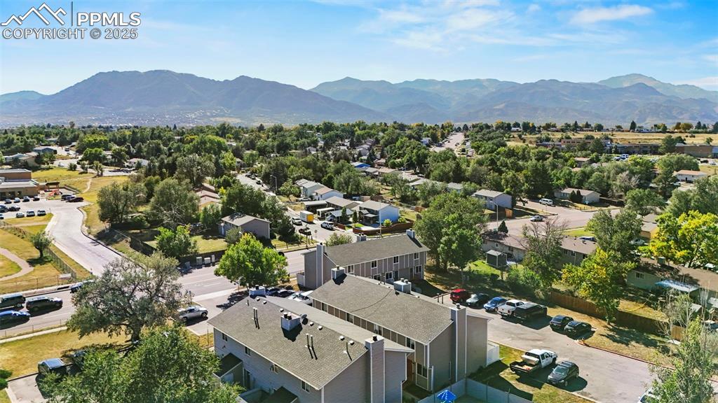 Aerial view of residential area with a mountainous background