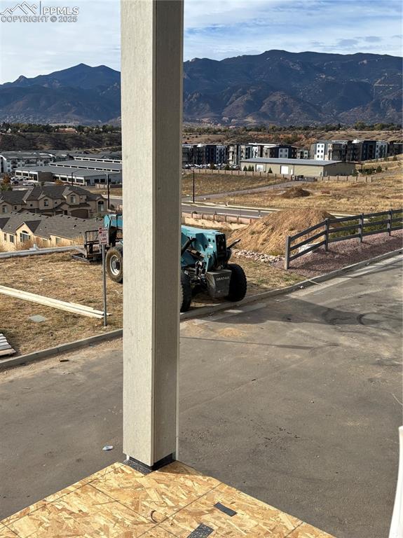 Mountain view featuring nearby suburban area