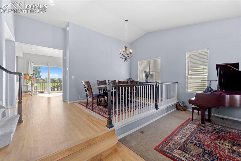Bright dining area with wood flooring