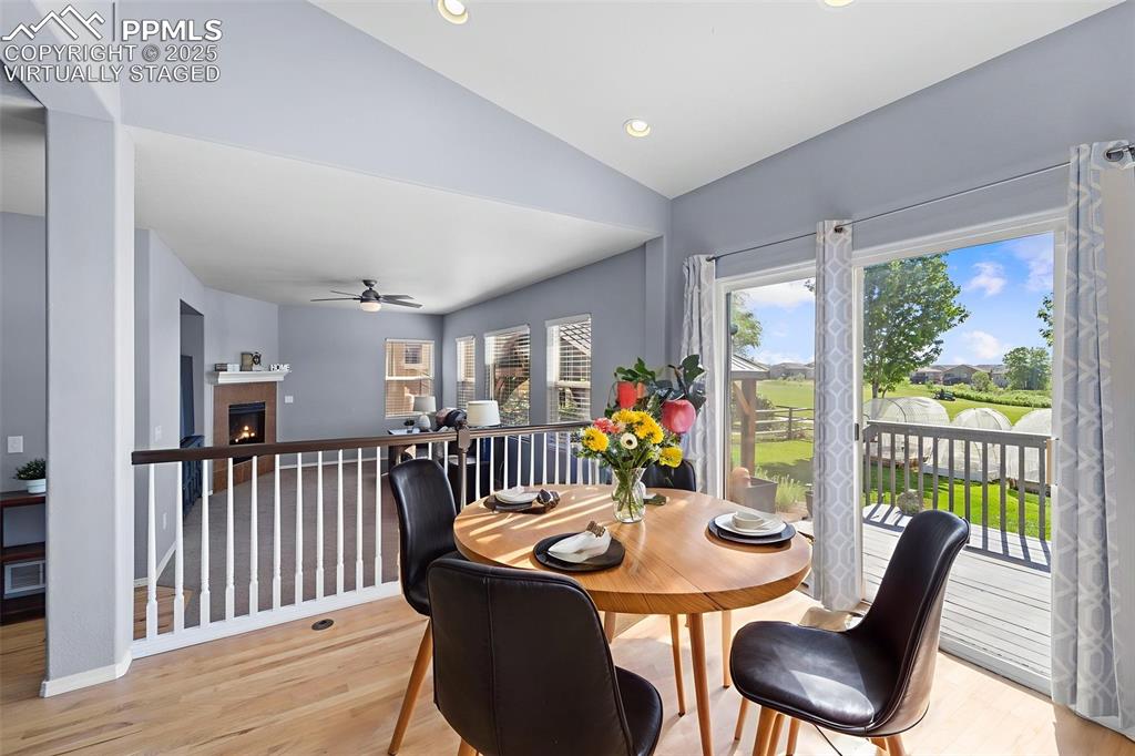 Virtually Staged / Dining with backyard and deck access
