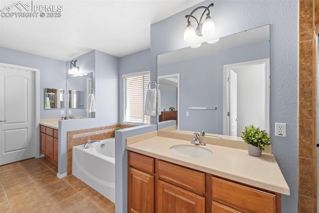 Full bathroom with dual sinks

