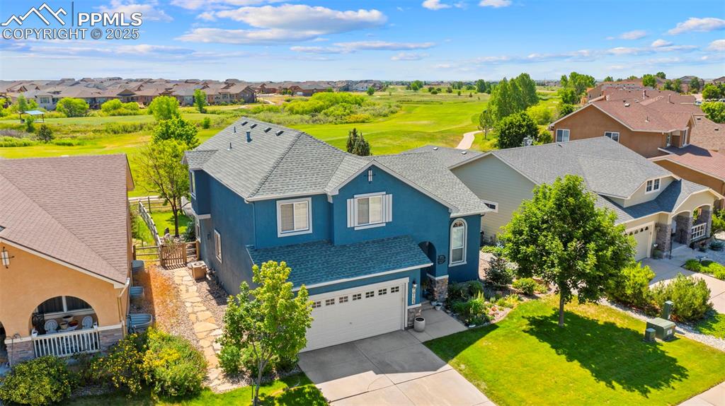 Aerial view of home within quiet neighborhood