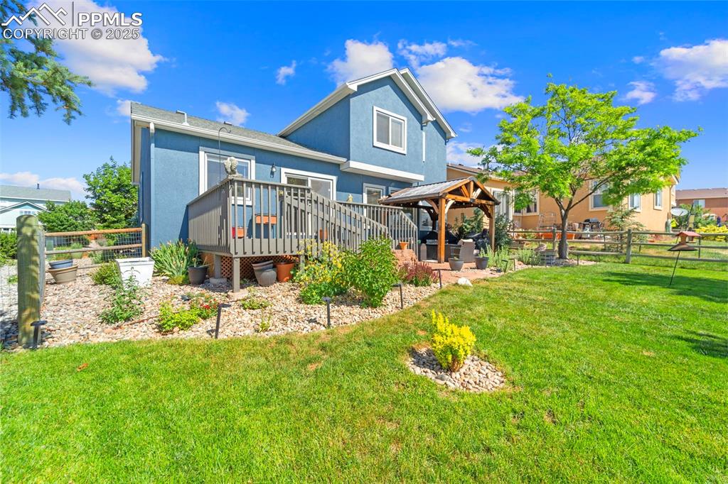 Rear view with mature landscaping