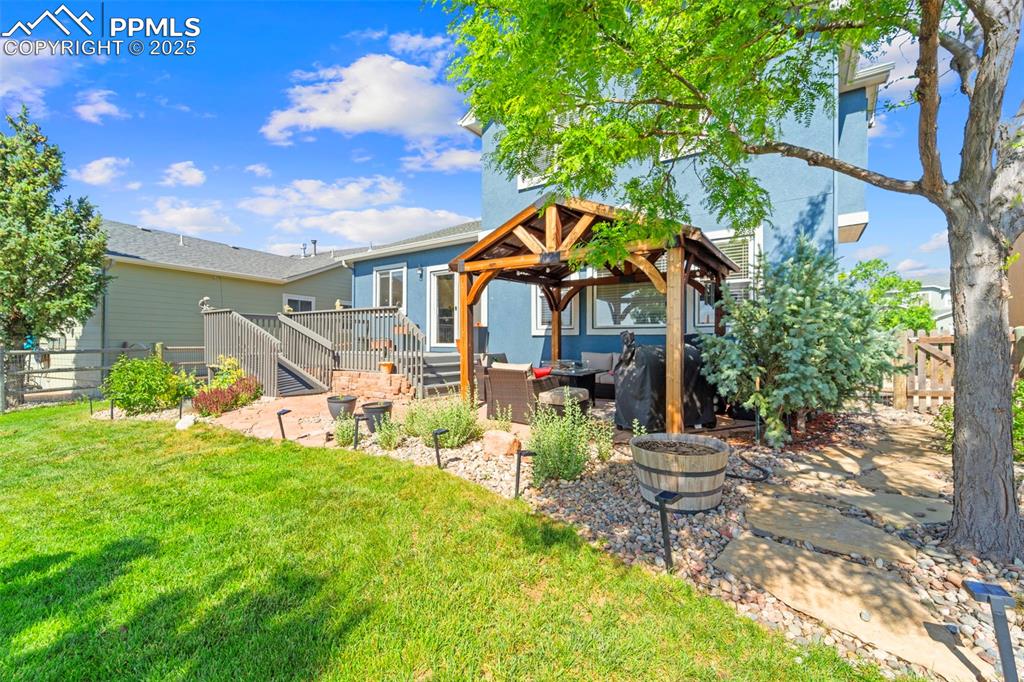 Grassy yard ideal for play or pets