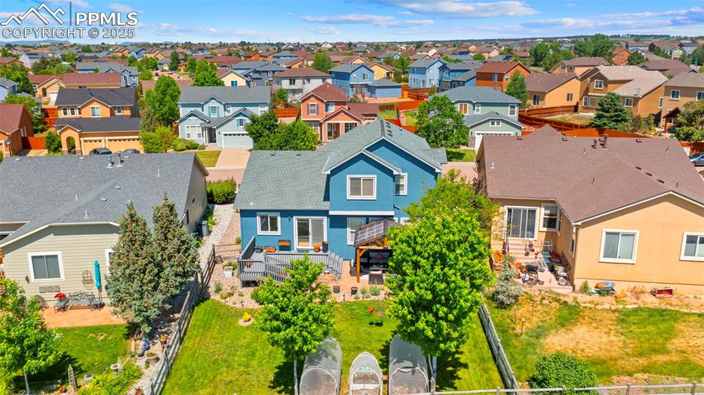 Aerial view showing spacious backyard