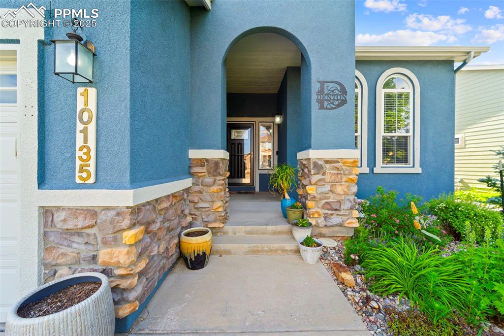 Covered front entry with stone detail