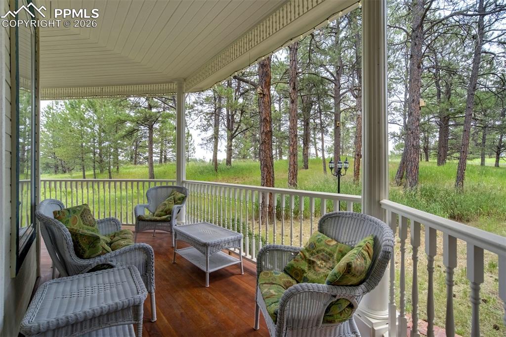 Covered front porch with hot tub