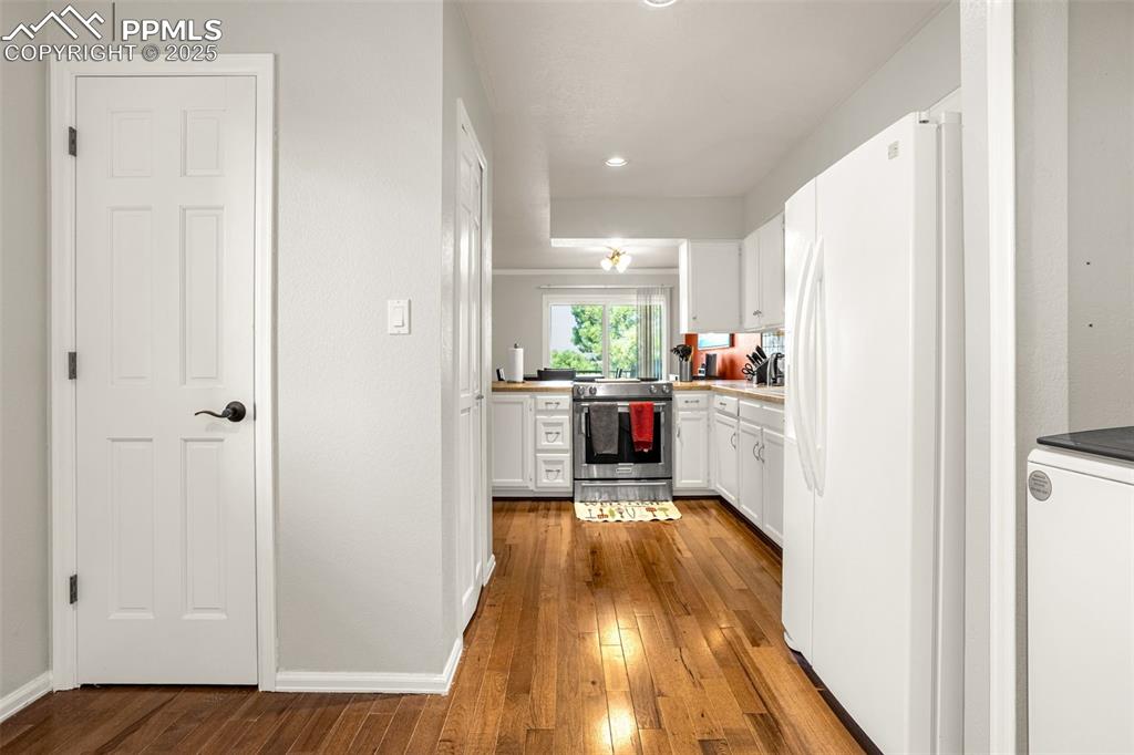 Entry from garage, pantry & laundry