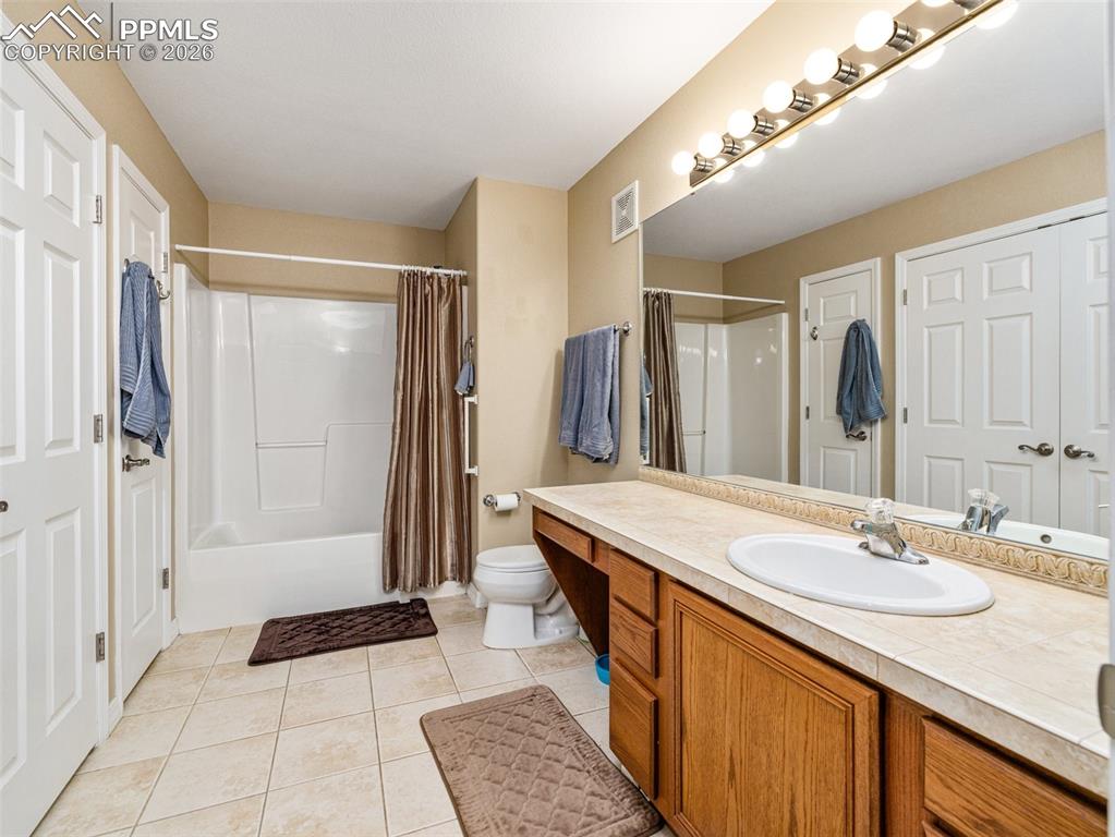 Main Bathroom with laundry area