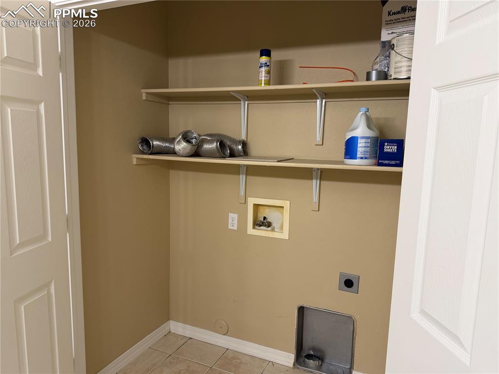 Laundry area in main bath.