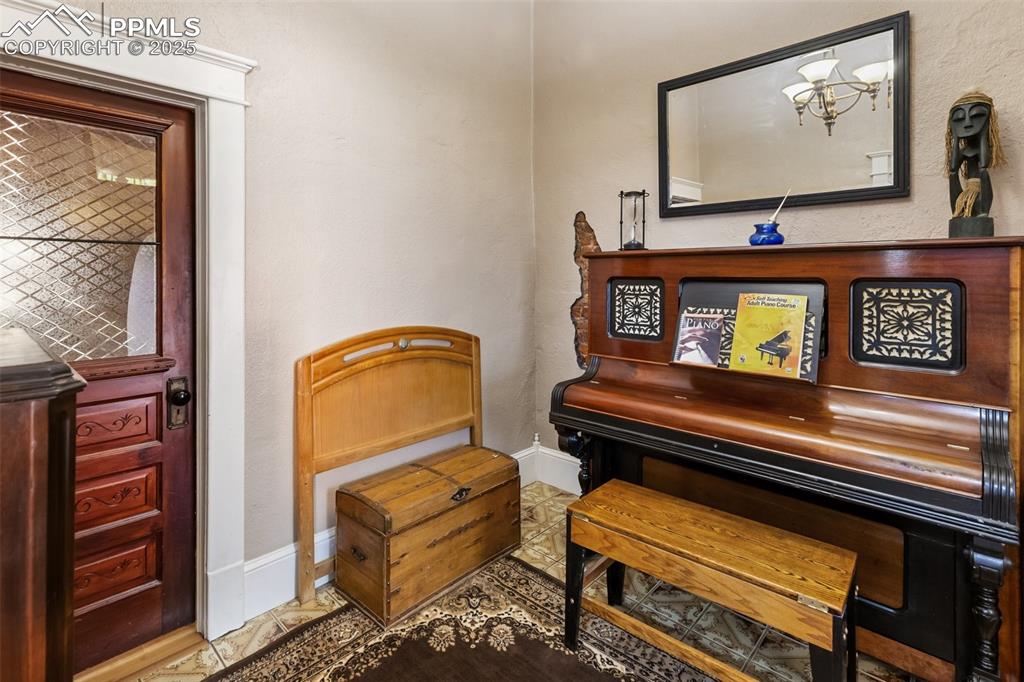 another view of the Foyer or Piano Room. You can the window in the door into the Second Bedroom
