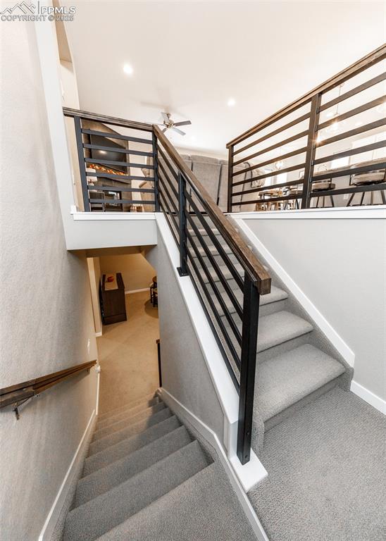 Well-designed staircase leads to a full basement, offering additional space for family living or entertainment.