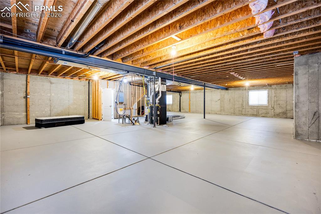 Below grade area with heating unit