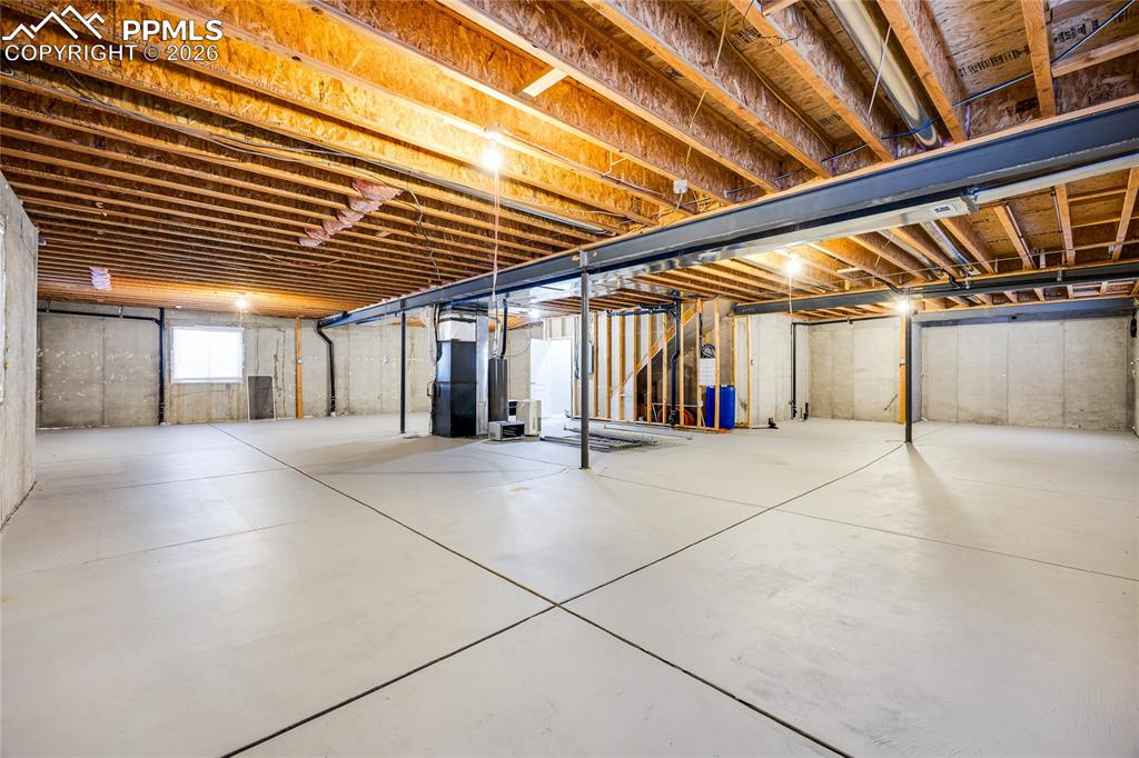 Below grade area featuring heating unit