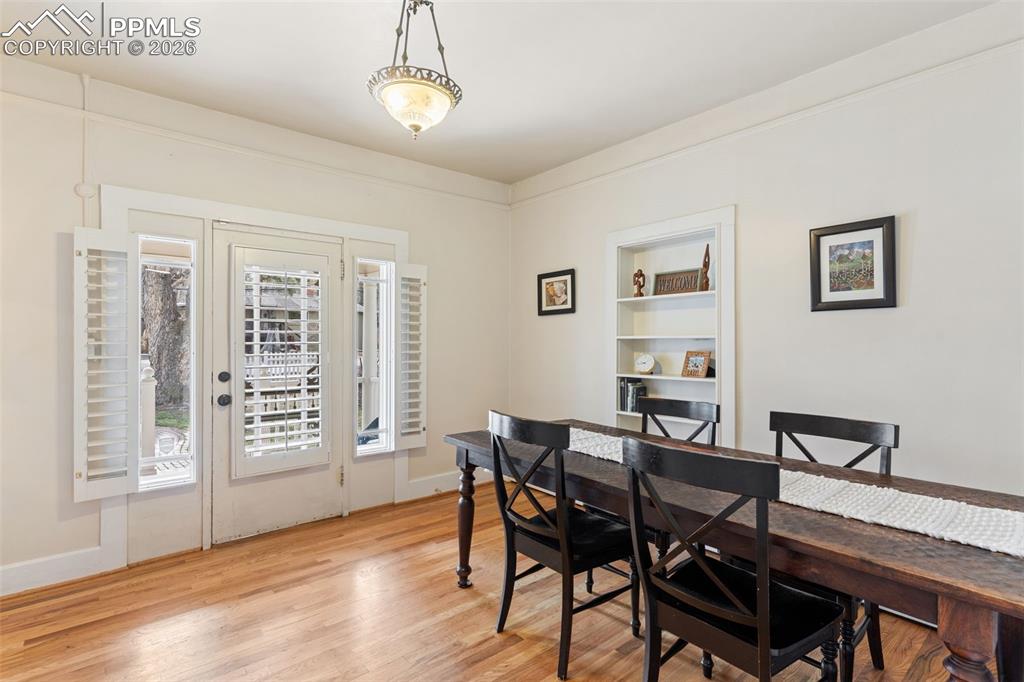 Beautiful entry way also serves as a lovely dining room with beautiful hardwood floors.