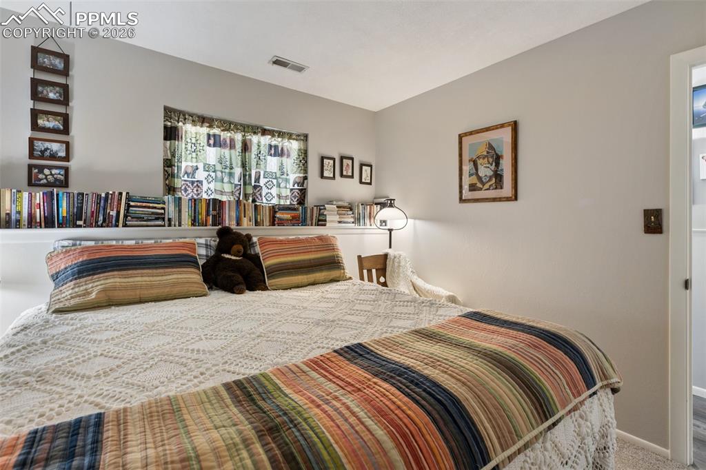 Bedroom with carpet