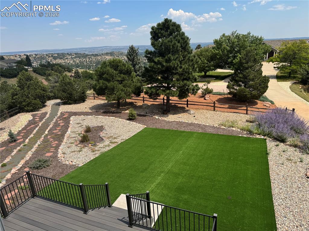 View of yard with a deck