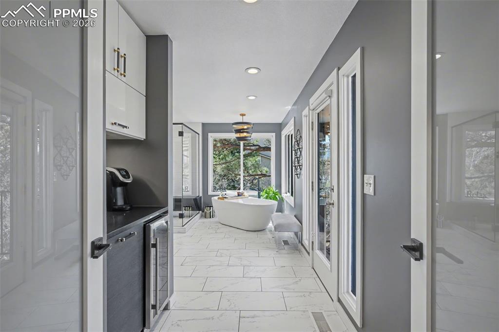 Primary Bathroom with coffee bar and walk out to expansive deck