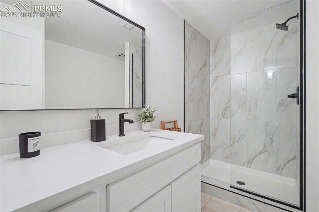 modern remodeled basement bathroom
