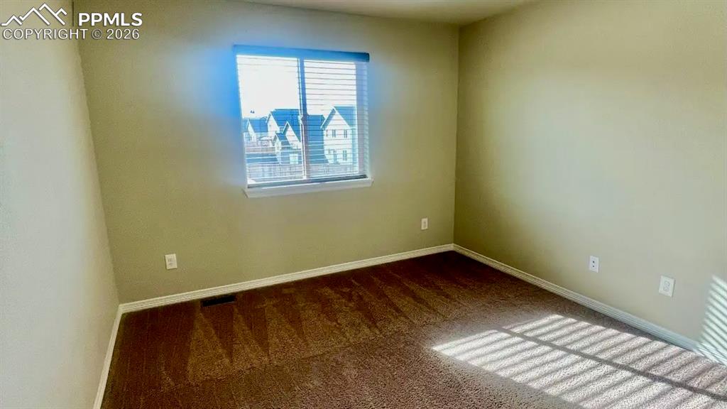 Bright upper-level bedroom