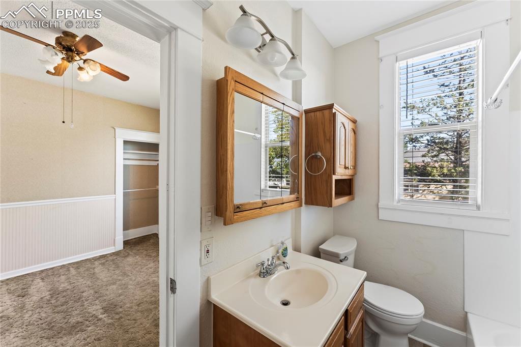 Full bath with vanity and toilet