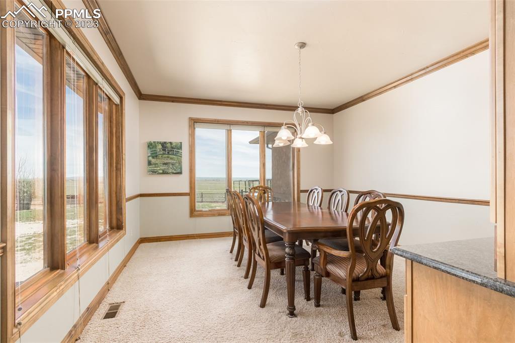 Large formal dining room for plenty of seating for company and guests. 