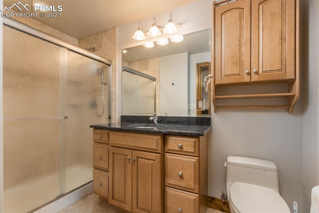 3/4 basement bath located between both bedrooms and off the family room. 
