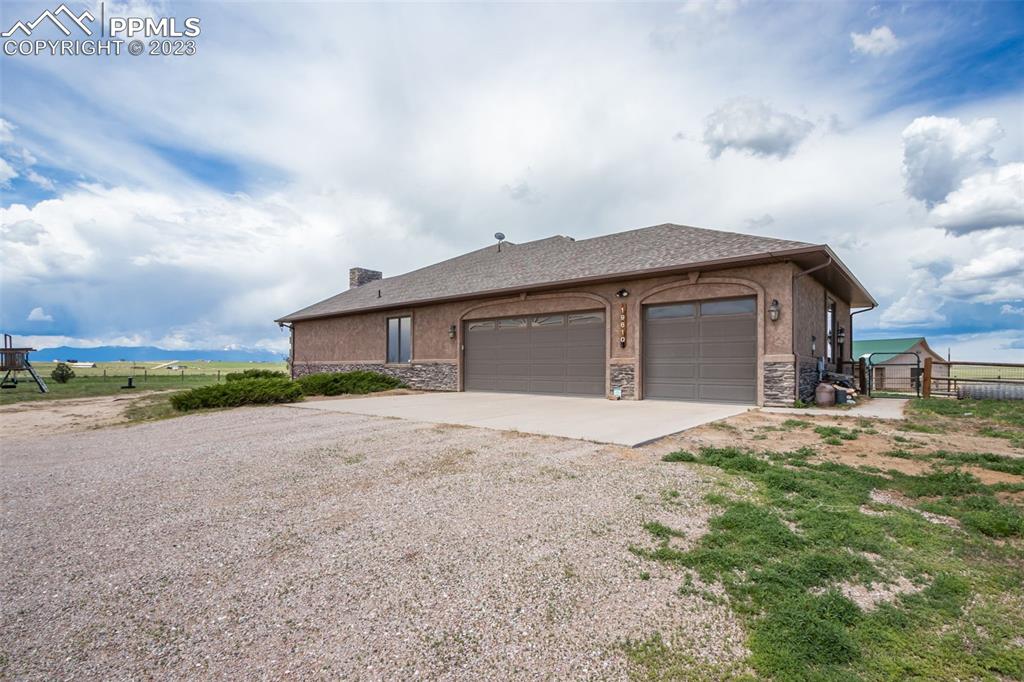 Oversized attached 3 car garage.