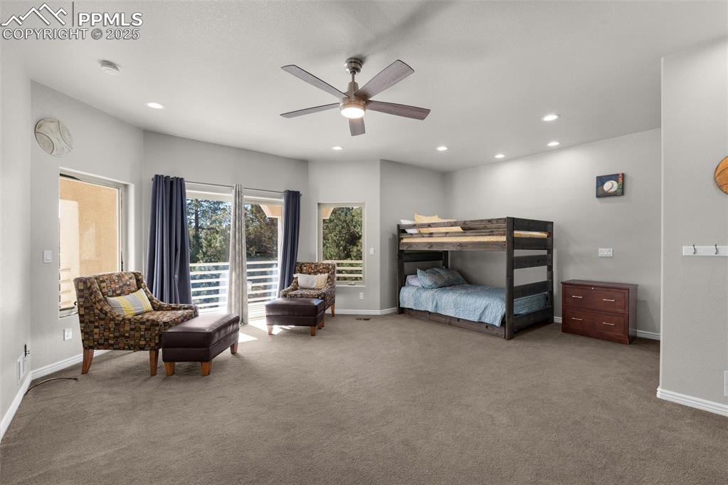 Bedroom featuring a ceiling fan, access to outside, recessed lighting, carpet flooring, and baseboards