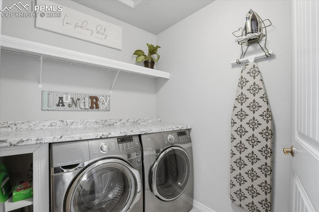 Custom laundry room located on the second floor next to the primary bedroom for added convenience 