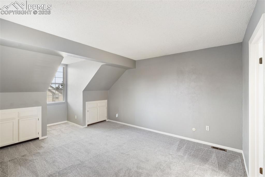 Primary Bedroom with adjoining bathroom and walk-in closet