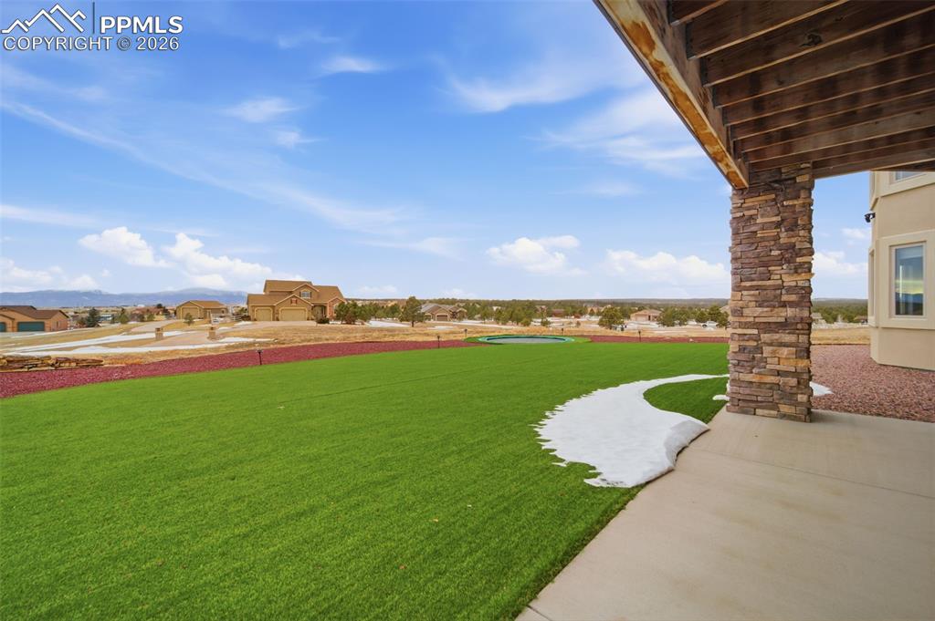 View of yard with a patio area