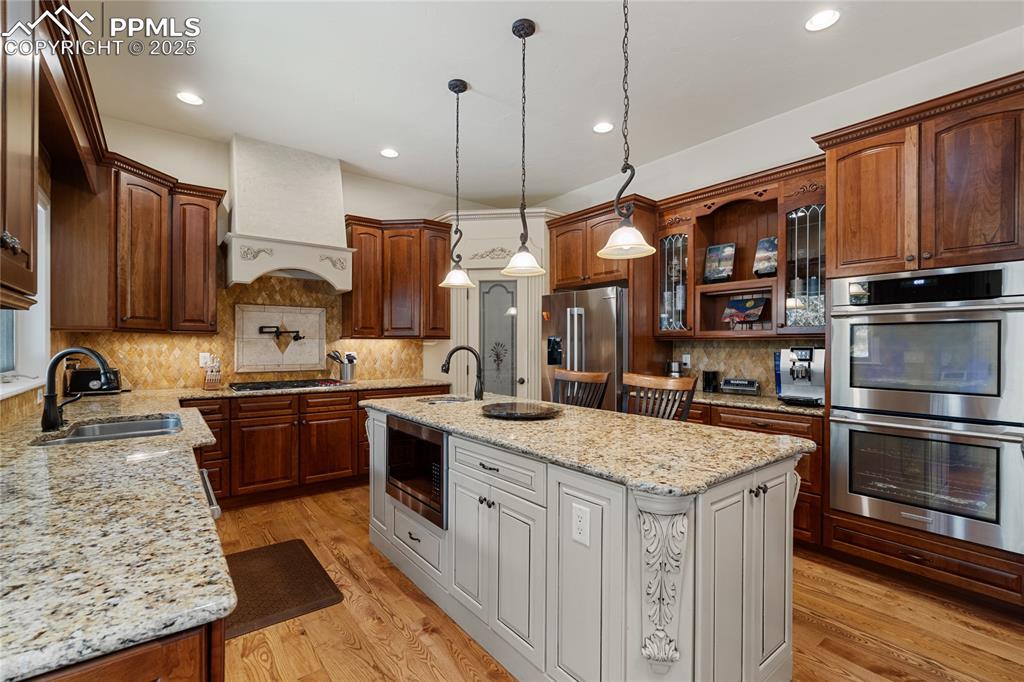 The kitchen has updated Bosch appliances.