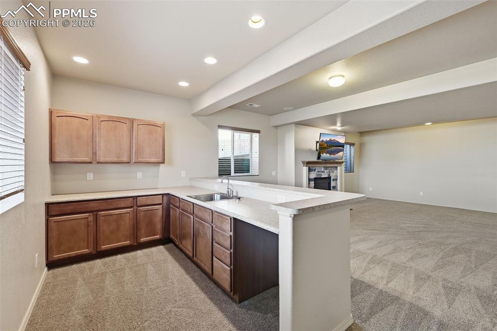 Equipped with sink and cabinets