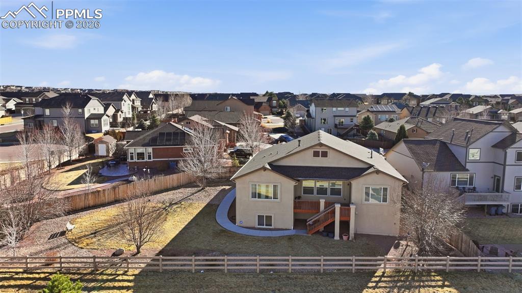 Large yard backed to trail