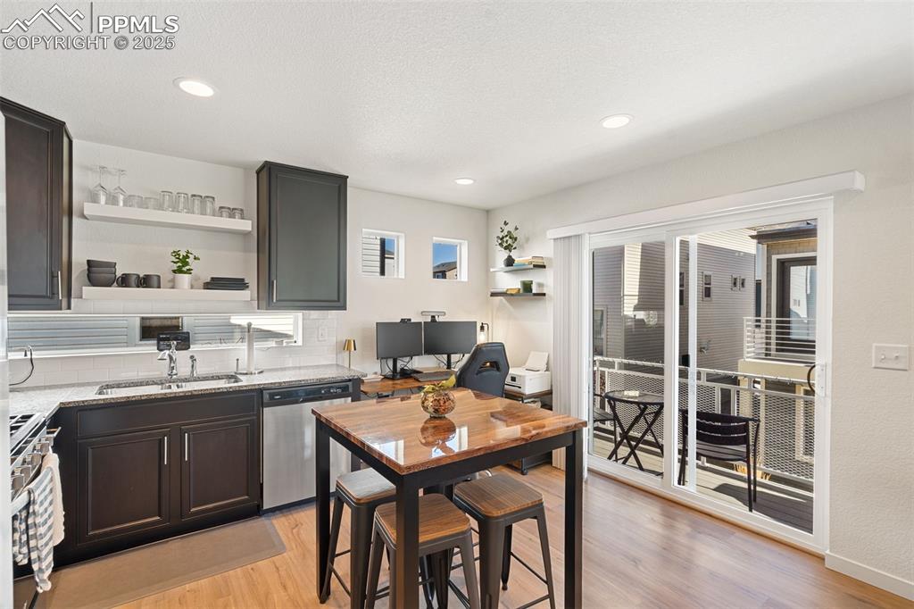 Kitchen/Dining Area + slider door to balcony-deck