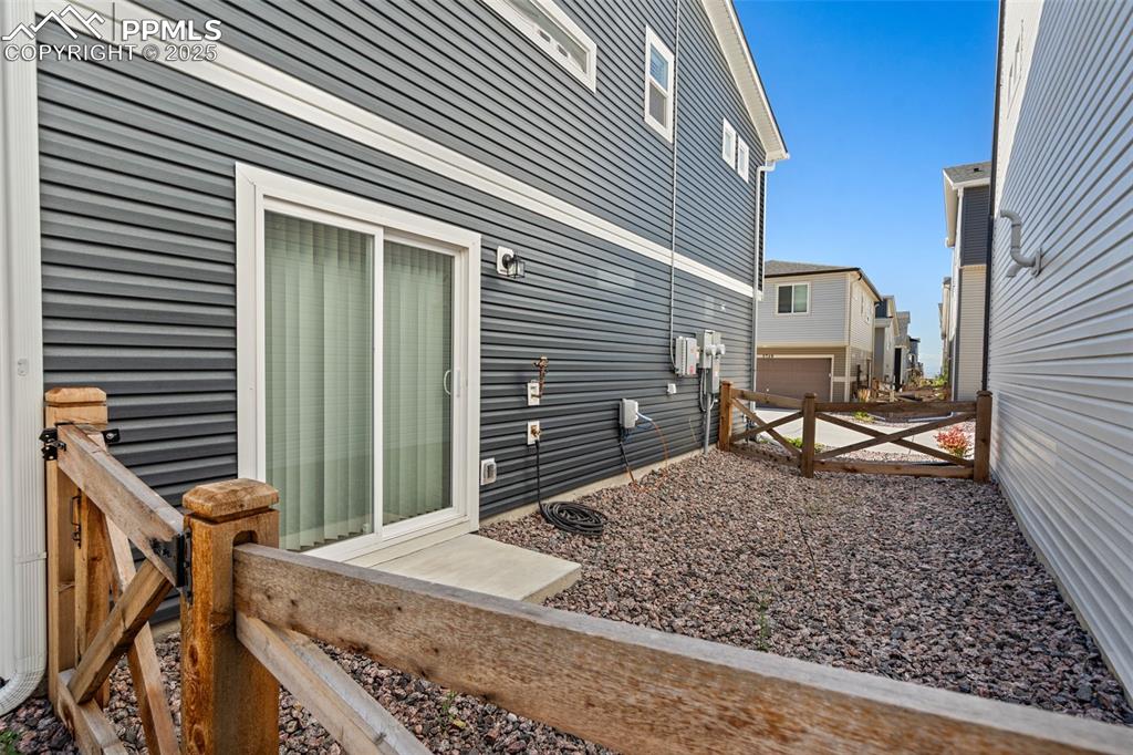 Fenced yard off 1st floor flex-room slider door