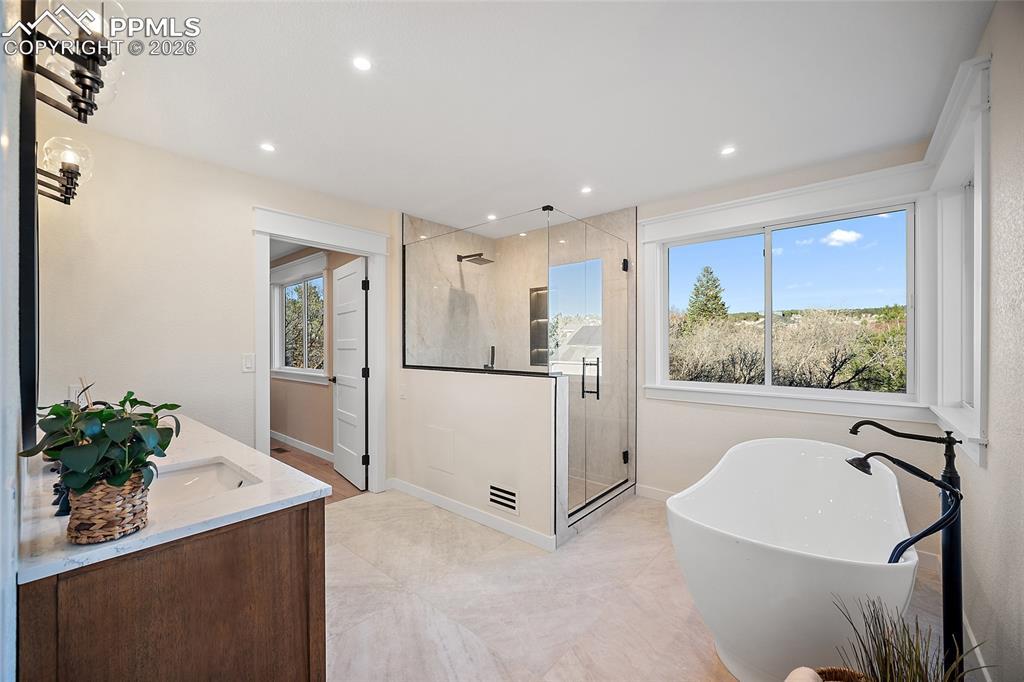 View of primary bathroom from water closet
