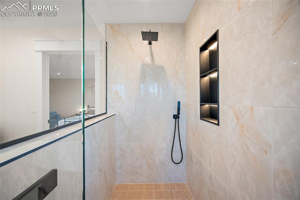 Spa inspired shower with a Moen Smart Shower control system