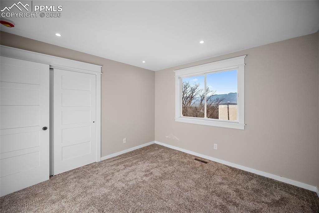 Second upstairs bedroom with view of the mountains