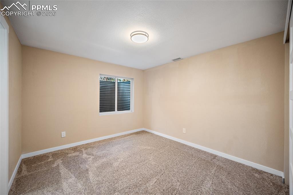 Basement bedroom with ensuite bath