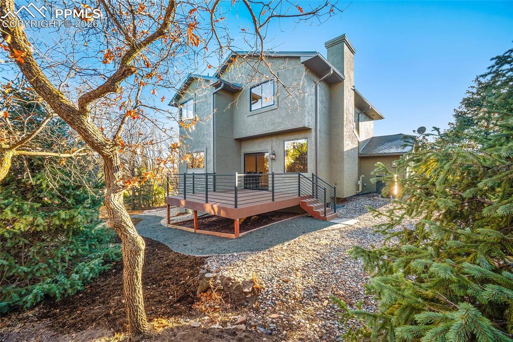 Back of home featuring a Trex composite deck