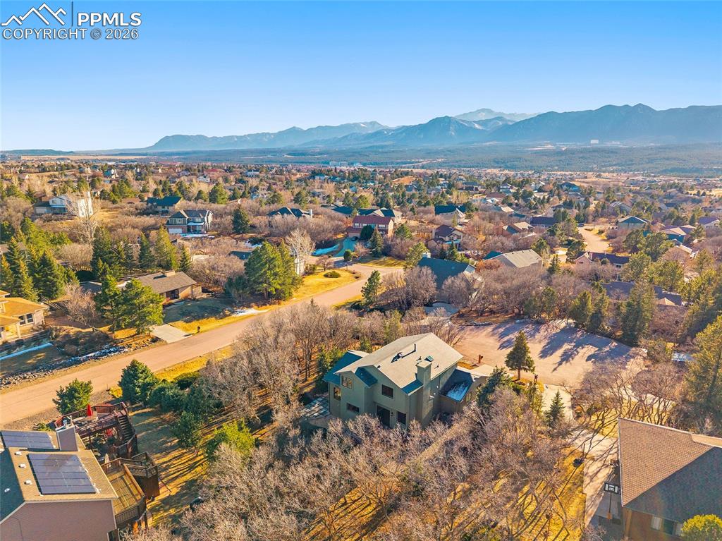 Aerial perspective of the neighborhood with the beloved Front Range